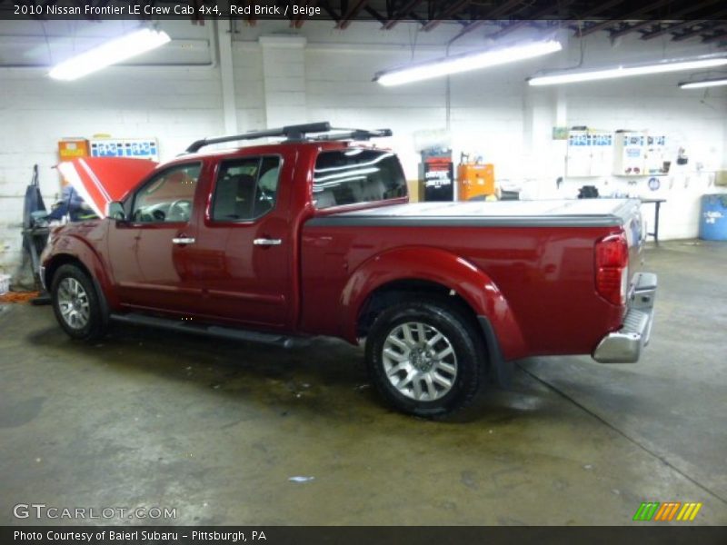 Red Brick / Beige 2010 Nissan Frontier LE Crew Cab 4x4