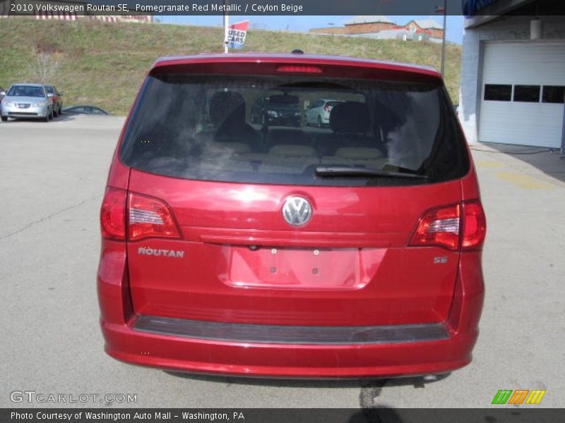 Pomegranate Red Metallic / Ceylon Beige 2010 Volkswagen Routan SE