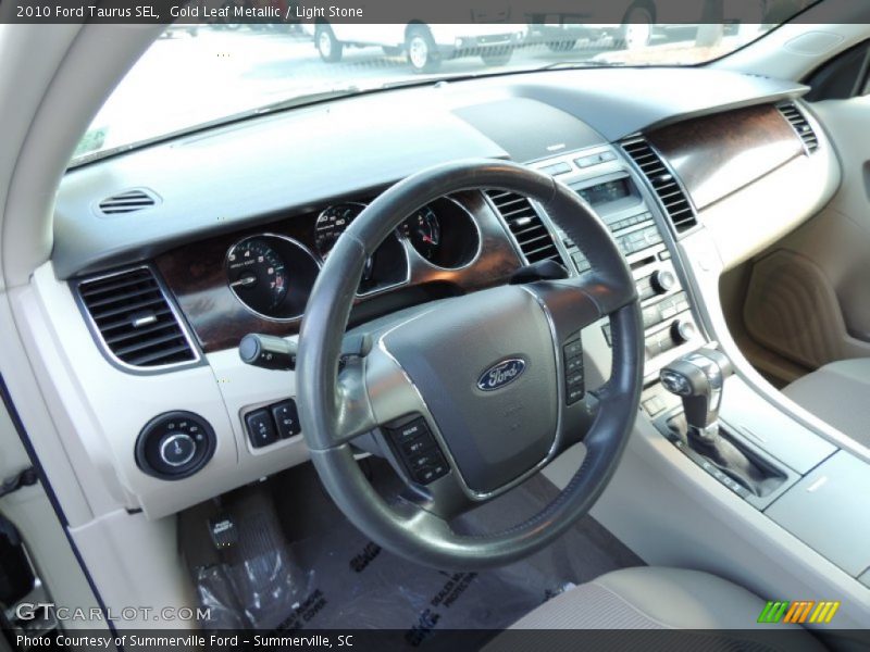 Gold Leaf Metallic / Light Stone 2010 Ford Taurus SEL