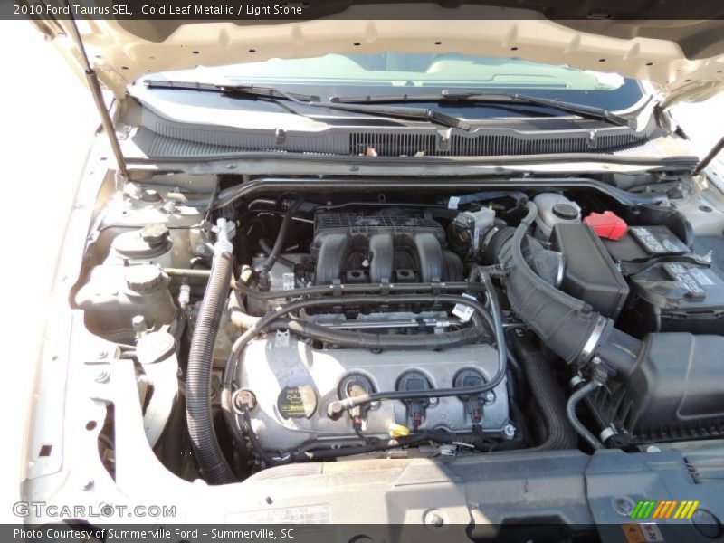 Gold Leaf Metallic / Light Stone 2010 Ford Taurus SEL