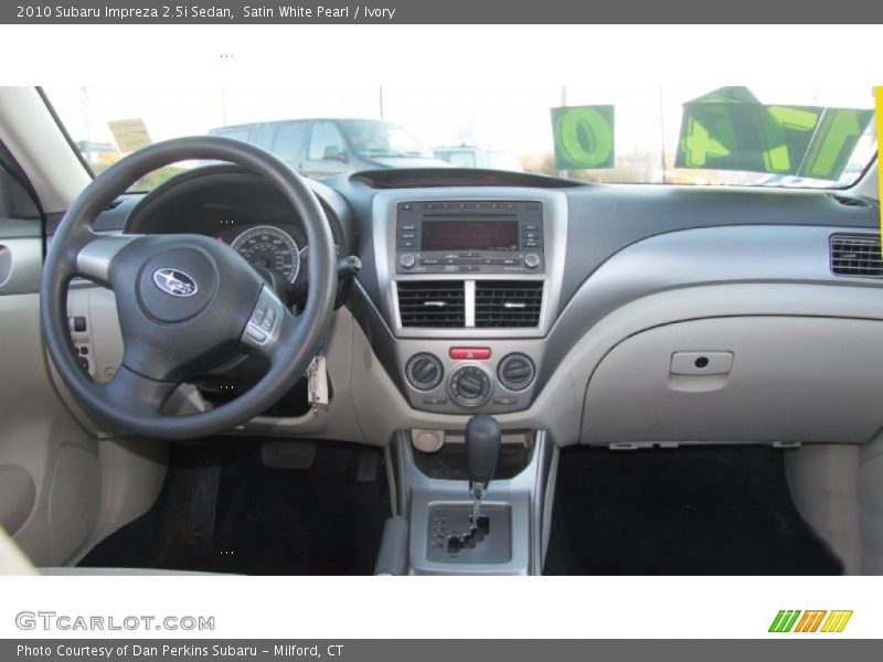 Satin White Pearl / Ivory 2010 Subaru Impreza 2.5i Sedan