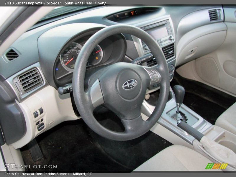 Satin White Pearl / Ivory 2010 Subaru Impreza 2.5i Sedan