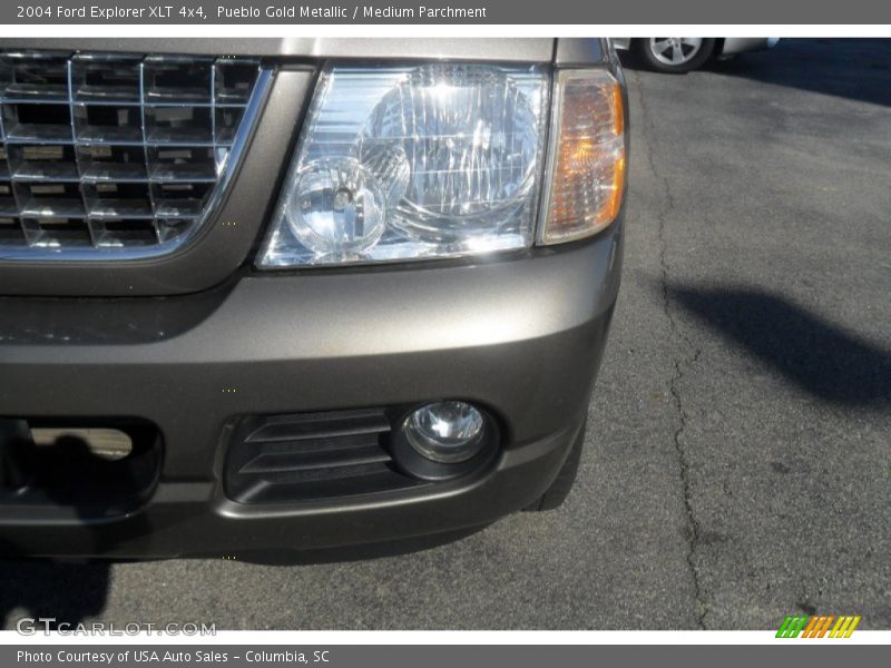 Pueblo Gold Metallic / Medium Parchment 2004 Ford Explorer XLT 4x4