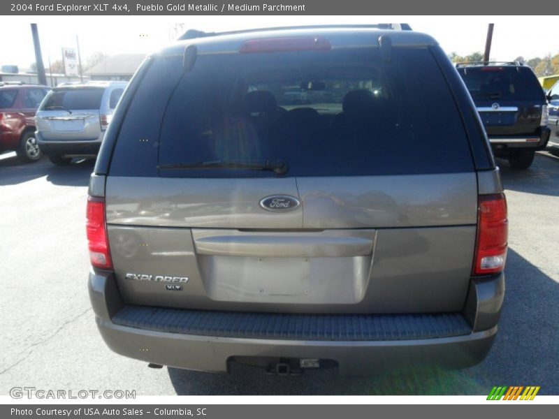 Pueblo Gold Metallic / Medium Parchment 2004 Ford Explorer XLT 4x4