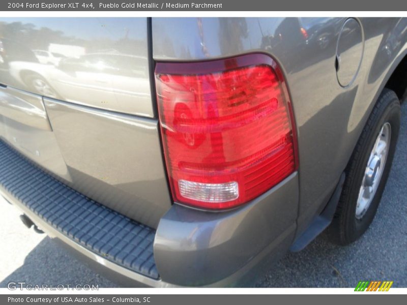 Pueblo Gold Metallic / Medium Parchment 2004 Ford Explorer XLT 4x4