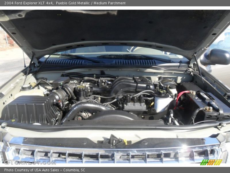 Pueblo Gold Metallic / Medium Parchment 2004 Ford Explorer XLT 4x4