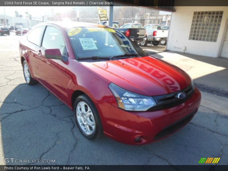 Sangria Red Metallic / Charcoal Black 2009 Ford Focus SE Coupe