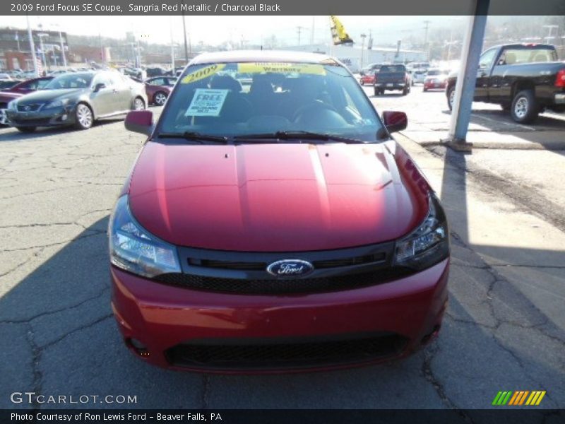 Sangria Red Metallic / Charcoal Black 2009 Ford Focus SE Coupe