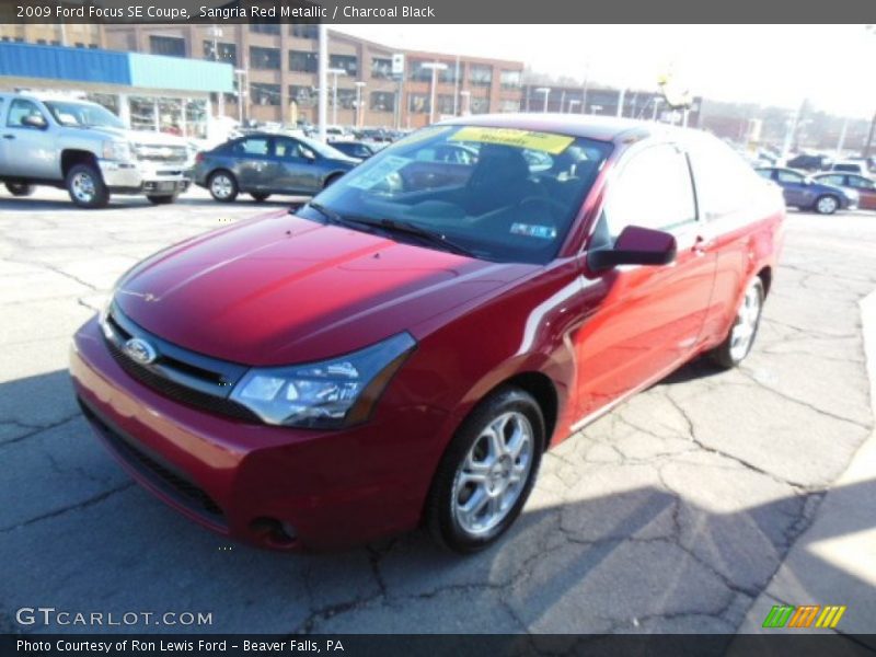 Sangria Red Metallic / Charcoal Black 2009 Ford Focus SE Coupe