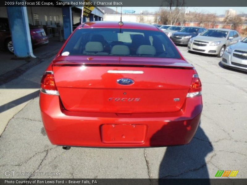Sangria Red Metallic / Charcoal Black 2009 Ford Focus SE Coupe