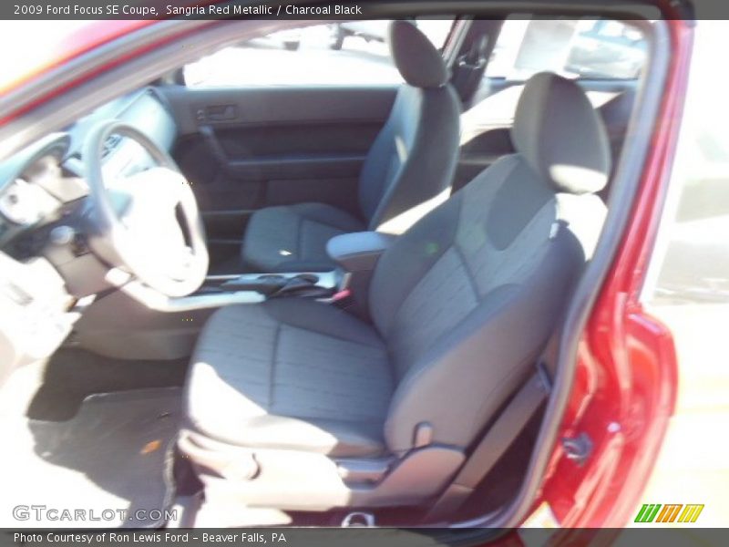 Sangria Red Metallic / Charcoal Black 2009 Ford Focus SE Coupe
