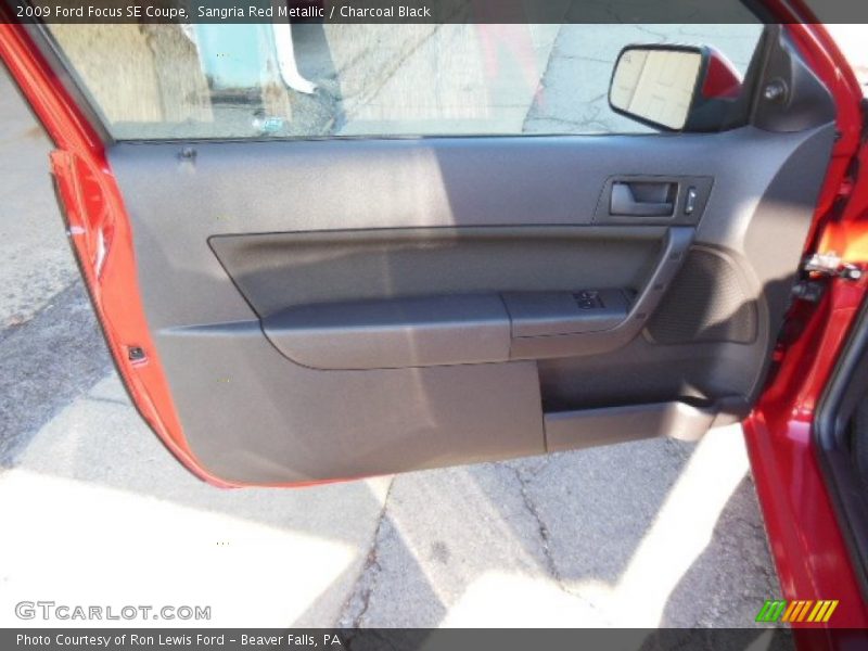 Sangria Red Metallic / Charcoal Black 2009 Ford Focus SE Coupe