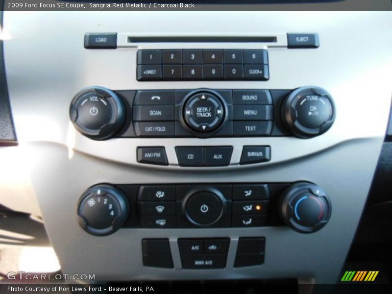 Sangria Red Metallic / Charcoal Black 2009 Ford Focus SE Coupe