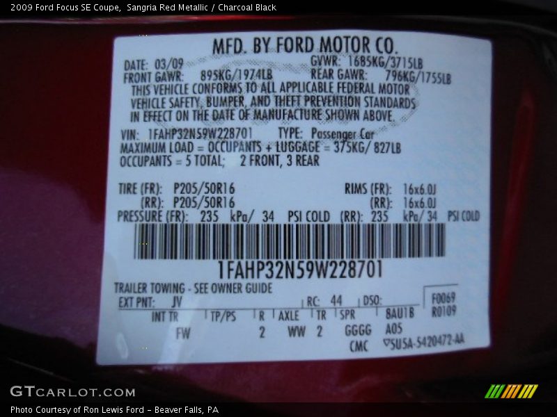 Sangria Red Metallic / Charcoal Black 2009 Ford Focus SE Coupe