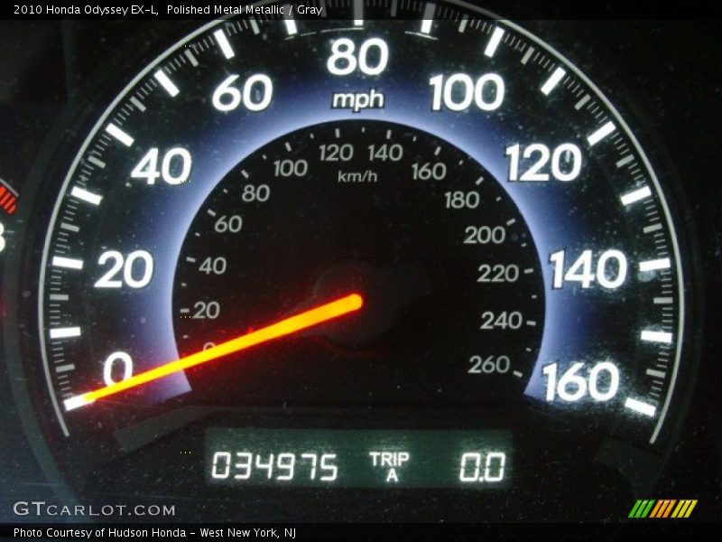 Polished Metal Metallic / Gray 2010 Honda Odyssey EX-L