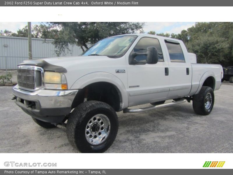 Front 3/4 View of 2002 F250 Super Duty Lariat Crew Cab 4x4