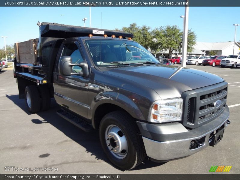 Front 3/4 View of 2006 F350 Super Duty XL Regular Cab 4x4 Dump Truck