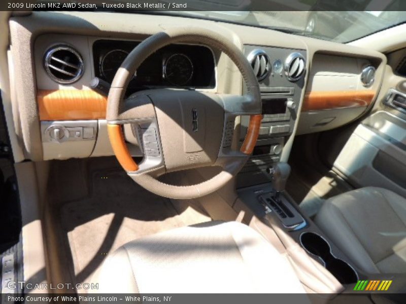Tuxedo Black Metallic / Sand 2009 Lincoln MKZ AWD Sedan
