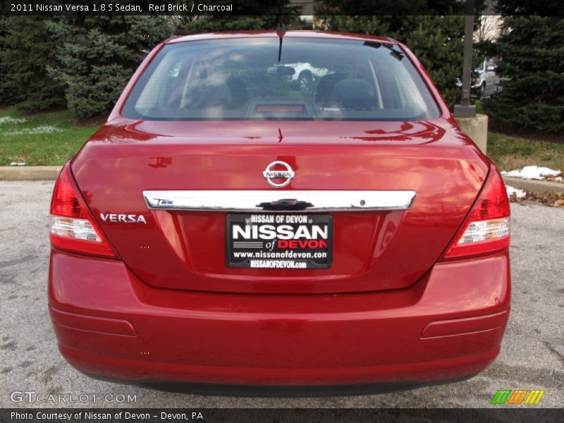 Red Brick / Charcoal 2011 Nissan Versa 1.8 S Sedan