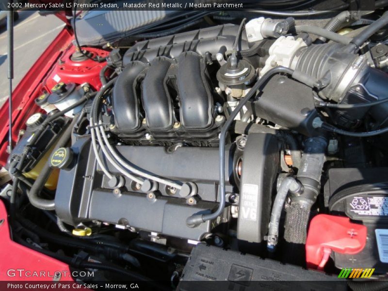 Matador Red Metallic / Medium Parchment 2002 Mercury Sable LS Premium Sedan