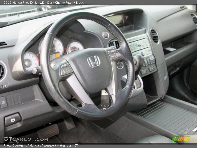 Dark Cherry Pearl / Black 2010 Honda Pilot EX-L 4WD