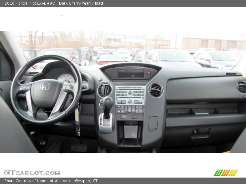 Dark Cherry Pearl / Black 2010 Honda Pilot EX-L 4WD