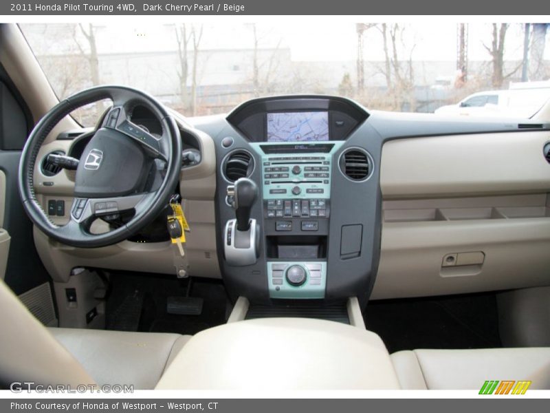 Dark Cherry Pearl / Beige 2011 Honda Pilot Touring 4WD