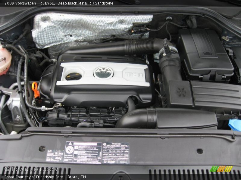 Deep Black Metallic / Sandstone 2009 Volkswagen Tiguan SE