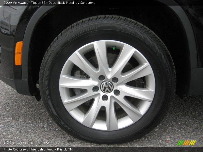 Deep Black Metallic / Sandstone 2009 Volkswagen Tiguan SE