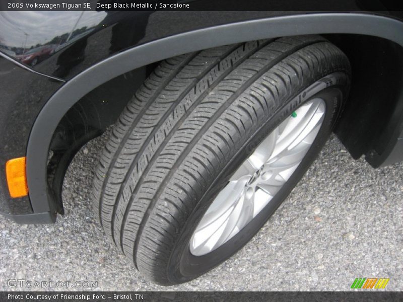 Deep Black Metallic / Sandstone 2009 Volkswagen Tiguan SE