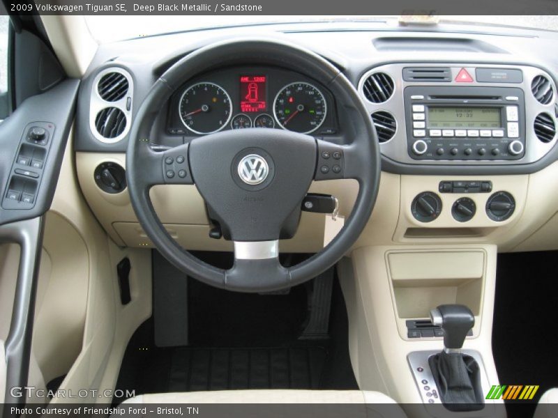 Deep Black Metallic / Sandstone 2009 Volkswagen Tiguan SE