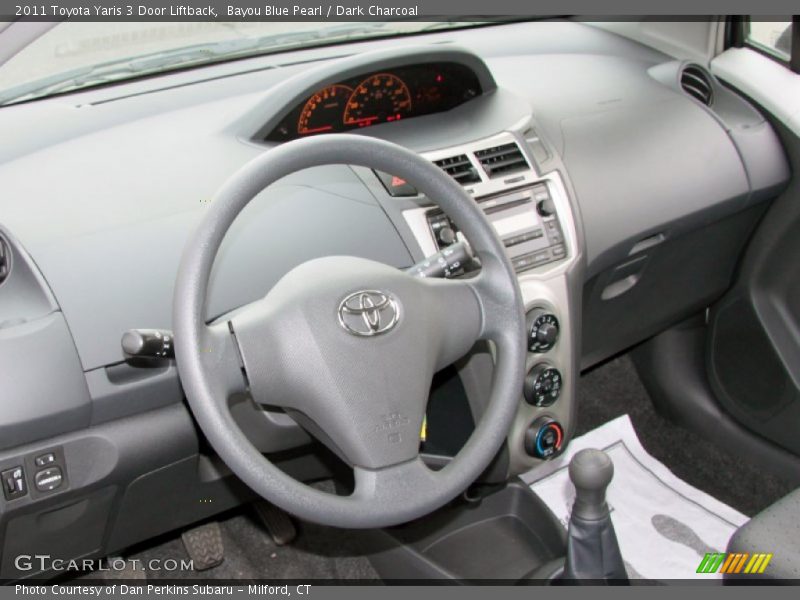 Bayou Blue Pearl / Dark Charcoal 2011 Toyota Yaris 3 Door Liftback