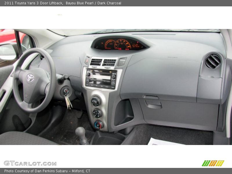 Bayou Blue Pearl / Dark Charcoal 2011 Toyota Yaris 3 Door Liftback