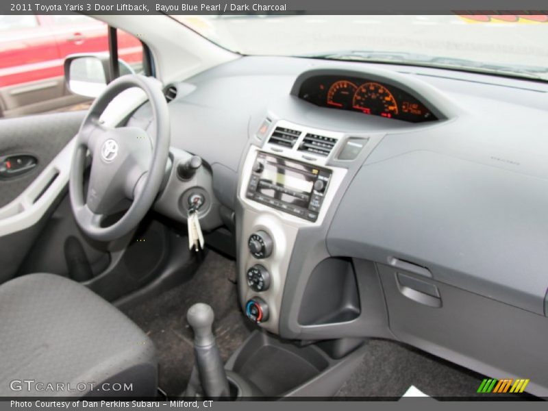 Bayou Blue Pearl / Dark Charcoal 2011 Toyota Yaris 3 Door Liftback