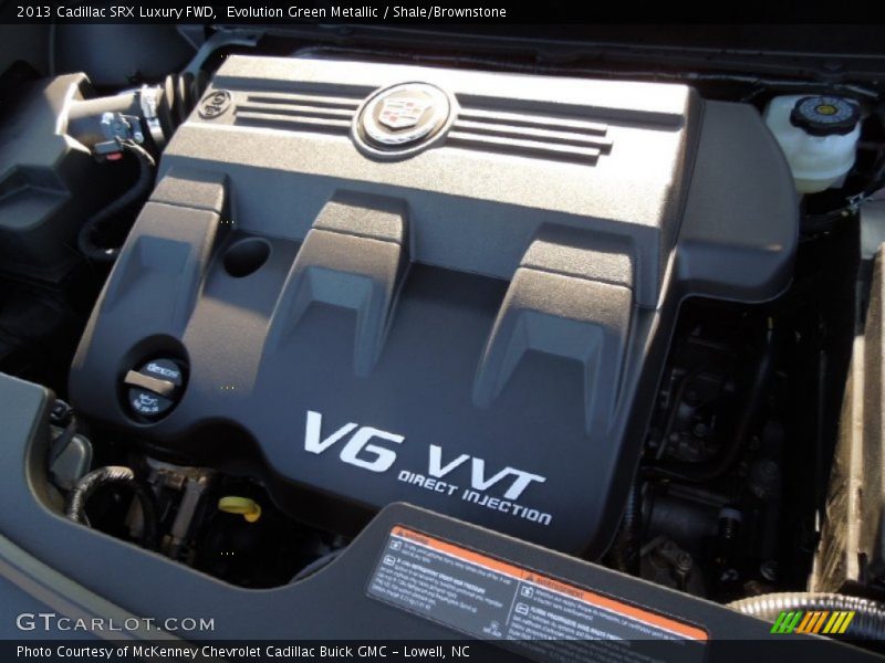 Evolution Green Metallic / Shale/Brownstone 2013 Cadillac SRX Luxury FWD