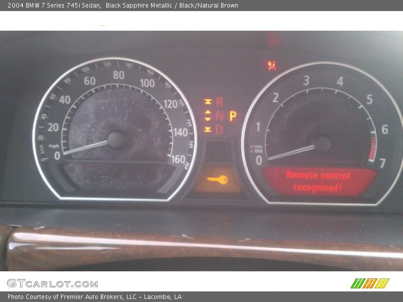 Black Sapphire Metallic / Black/Natural Brown 2004 BMW 7 Series 745i Sedan