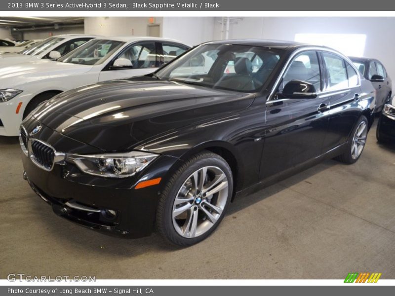 Front 3/4 View of 2013 3 Series ActiveHybrid 3 Sedan