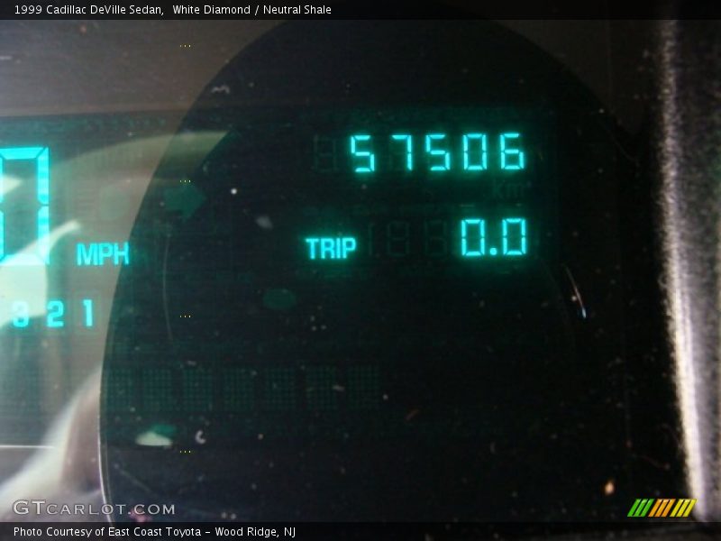 White Diamond / Neutral Shale 1999 Cadillac DeVille Sedan
