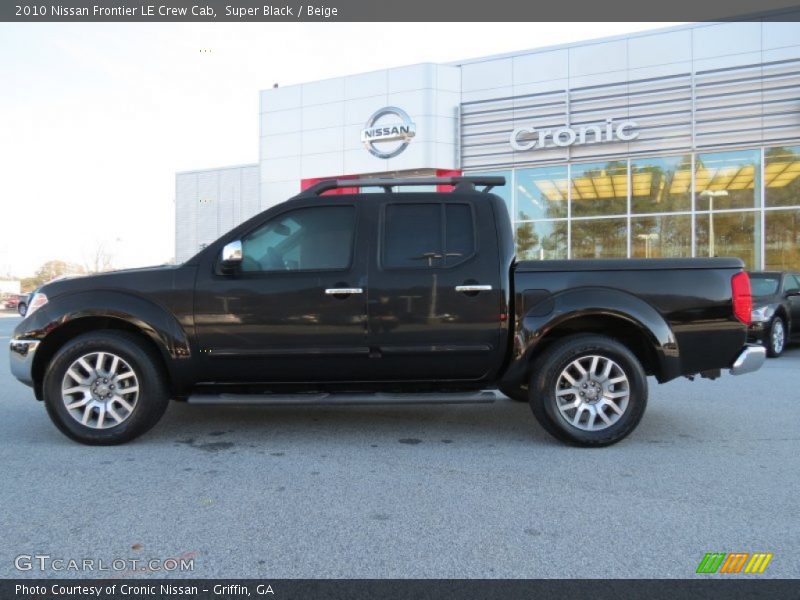 Super Black / Beige 2010 Nissan Frontier LE Crew Cab