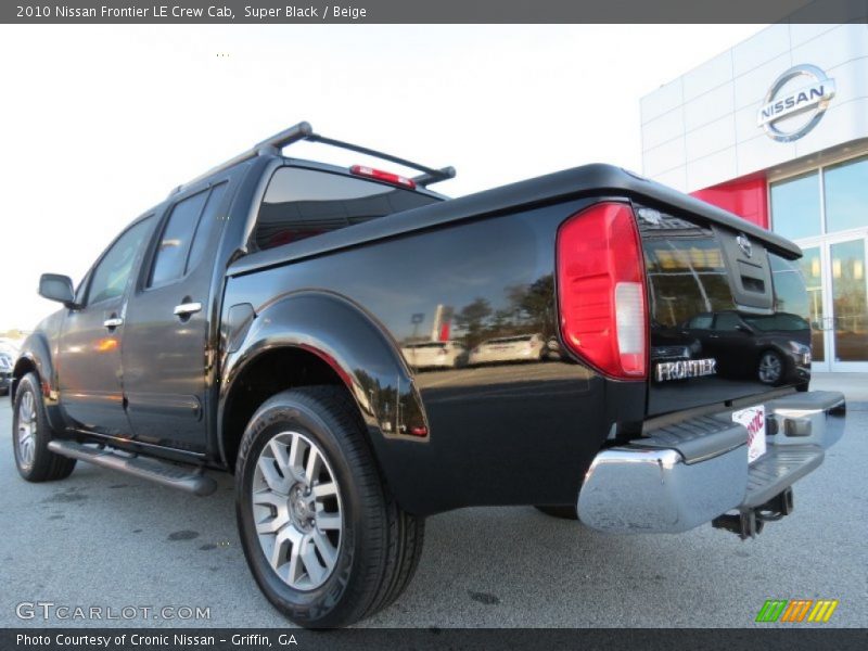 Super Black / Beige 2010 Nissan Frontier LE Crew Cab