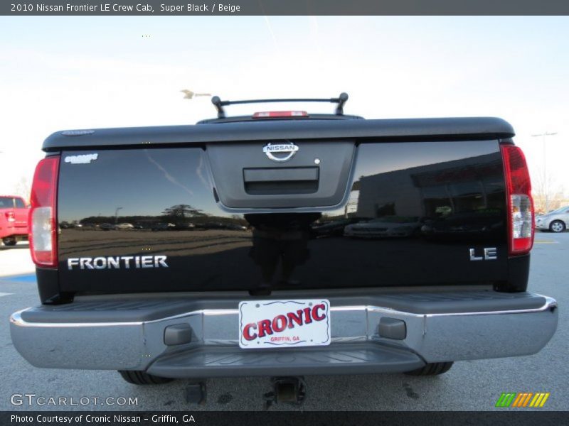 Super Black / Beige 2010 Nissan Frontier LE Crew Cab