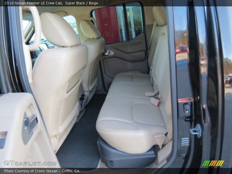 Super Black / Beige 2010 Nissan Frontier LE Crew Cab