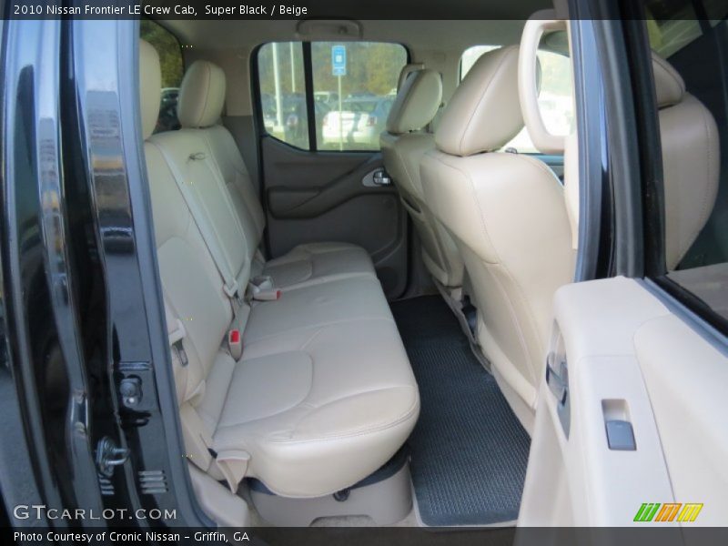 Super Black / Beige 2010 Nissan Frontier LE Crew Cab