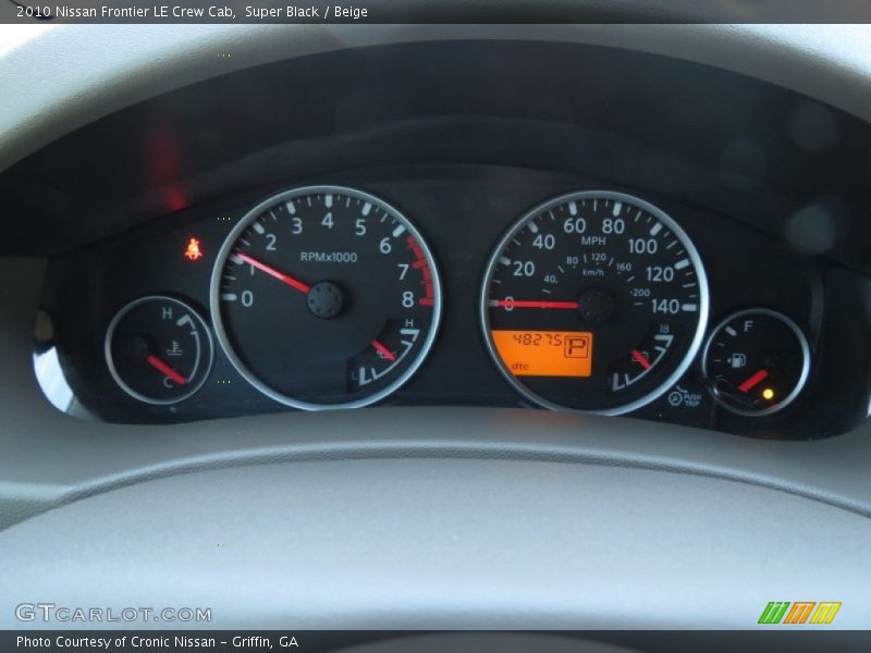 Super Black / Beige 2010 Nissan Frontier LE Crew Cab