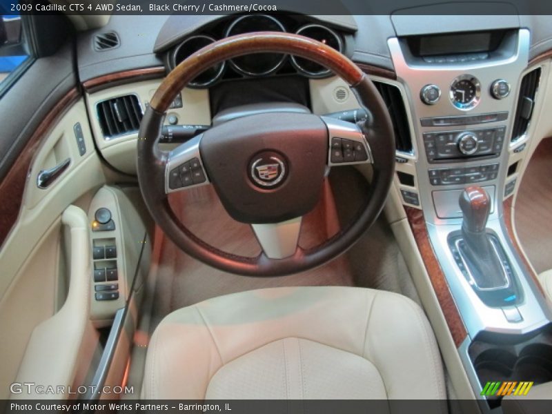 Black Cherry / Cashmere/Cocoa 2009 Cadillac CTS 4 AWD Sedan