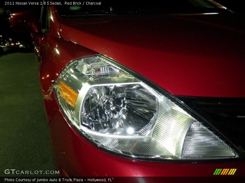 Red Brick / Charcoal 2011 Nissan Versa 1.8 S Sedan