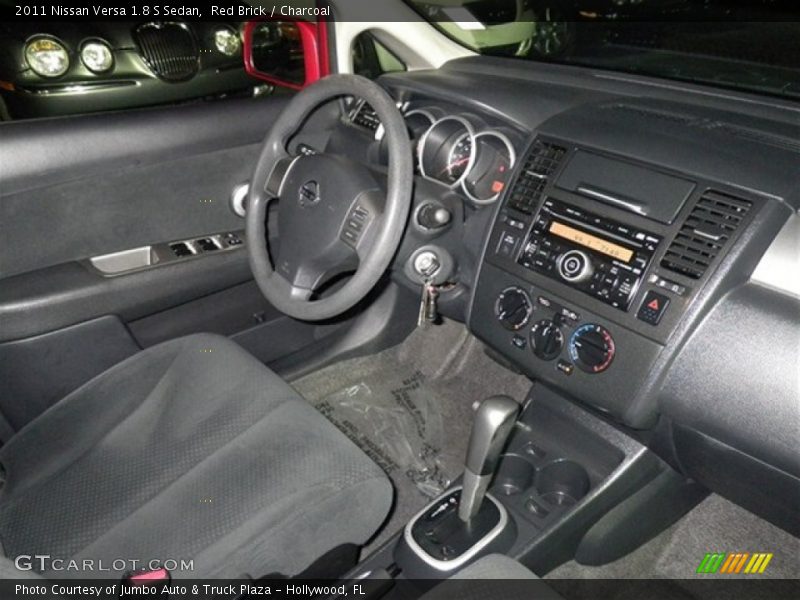 Red Brick / Charcoal 2011 Nissan Versa 1.8 S Sedan