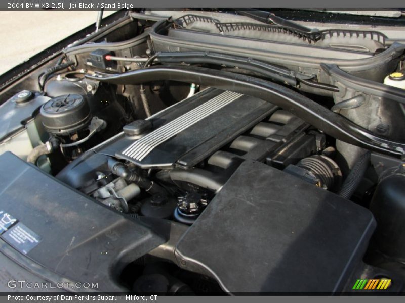 Jet Black / Sand Beige 2004 BMW X3 2.5i