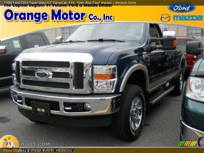 Dark Blue Pearl Metallic / Medium Stone 2009 Ford F250 Super Duty XLT SuperCab 4x4