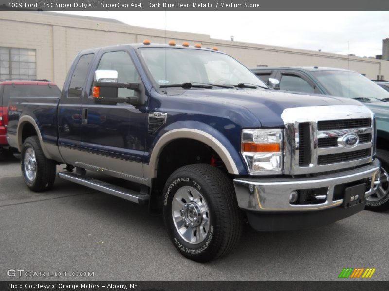 Dark Blue Pearl Metallic / Medium Stone 2009 Ford F250 Super Duty XLT SuperCab 4x4